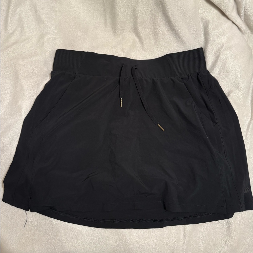 Black Tennis Skirt (all in motion)